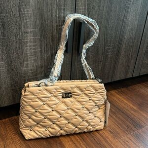 Gilda Paris NWT Waffle Quilted Handbag in Beige with gunmetal color hardware.